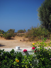 Image showing  Sifnos Greek Island scene cup of coffee white wall with autumn 