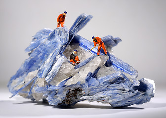 Image showing Miniature Workers in the Mining of Minerals Field