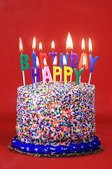 Image showing Birthday Celebration Candles on Red Background