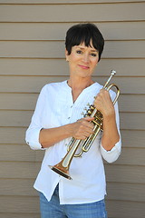 Image showing Female trumpet player.