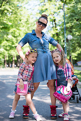 Image showing mother with her daughters in the park