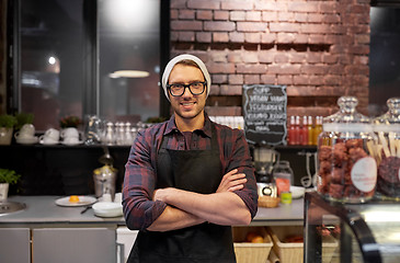 Image showing happy seller man or barman at cafe counter