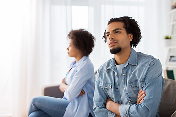 Image showing unhappy couple having argument at home