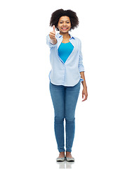 Image showing happy african american woman showing thumbs up