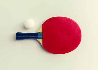 Image showing close up of table tennis rackets with ball