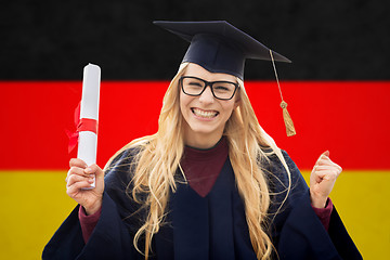 Image showing happy female student with diploma over german flag