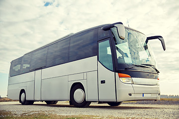 Image showing tour bus driving outdoors