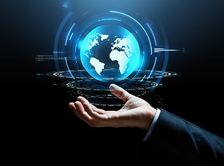 Image showing businessman hand virtual earth projection