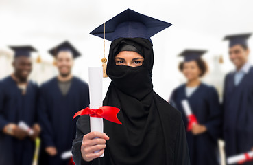 Image showing muslim student woman in hijab with diploma