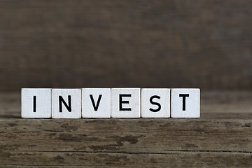 Image showing Invest, written in cubes    