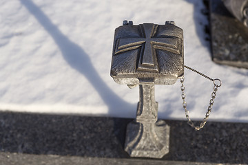 Image showing Holy water shell at a grave