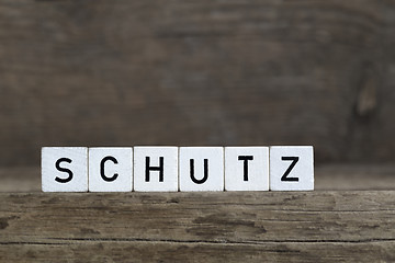 Image showing German word protection, written in cubes