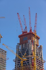 Image showing Construction of skyscrapers under blue sky