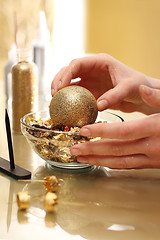 Image showing Decorating baubles, handmade