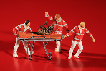 Image showing Posed Miniature Paramedics Treating the Honeybee Crisis