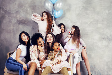 Image showing Lifestyle and people concept: young pretty diversity nations woman with different age children celebrating on birth day party together happy smiling, making selfie. African-american, asian and caucasi