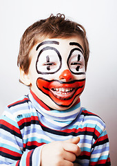 Image showing little cute boy with facepaint like clown, pantomimic expression