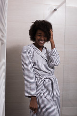 Image showing beautiful black woman wearing  bathrobe