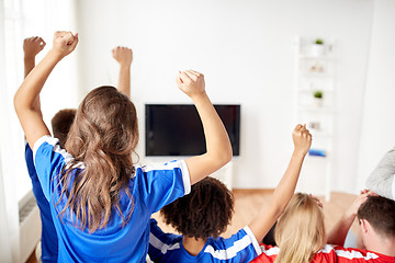 Image showing friends or football fans watching tv at home