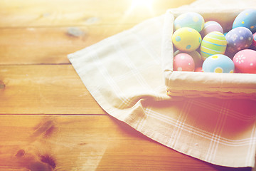 Image showing close up of colored easter eggs in basket