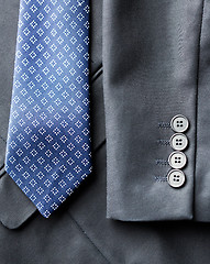 Image showing close up of business suit jacket and tie