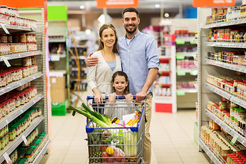 Image showing family with food in shopping cart at grocery store