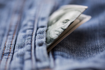 Image showing dollar money in pocket of denim jacket