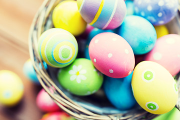 Image showing close up of colored easter eggs in basket