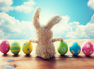 Image showing close up of colored easter eggs and bunny