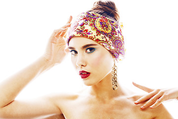 Image showing young pretty modern girl with bright shawl on head emotional pos