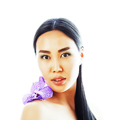 Image showing young pretty asian woman with flower orchid close up isolated sp