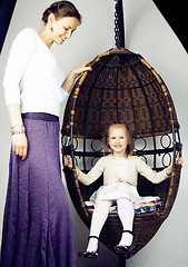 Image showing young mother with daughter at luxury home interior vintage