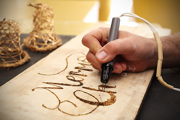 Image showing Pyrography, wood burning inscriptions 