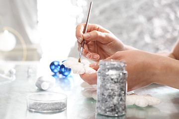 Image showing The glass bauble Christmas Tree decorated with glitter in art studio