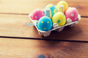 Image showing close up of colored easter eggs in egg box