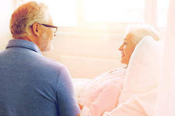 Image showing senior couple meeting at hospital ward