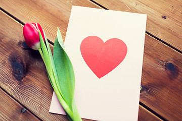 Image showing close up of flowers and greeting card with heart