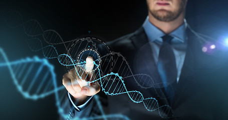 Image showing businessman with virtual dna molecule projection