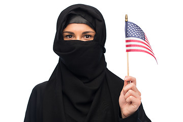 Image showing muslim woman in hijab with american flag