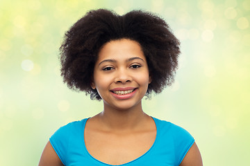 Image showing happy african american young woman over white