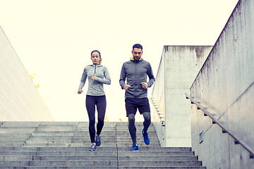 Image showing couple walking downstairs on stadium