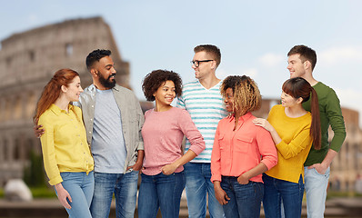 Image showing international group of happy people over coliseum