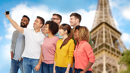 Image showing group of people taking selfie by smartphone