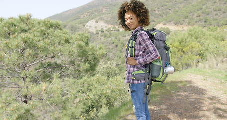 Image showing Young smiling tourist