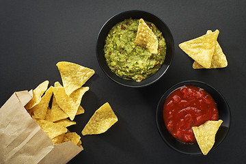 Image showing Guacamole and tomato salsa