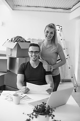 Image showing Young couple moving in a new home