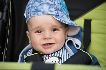 Image showing baby boy sitting in the pram