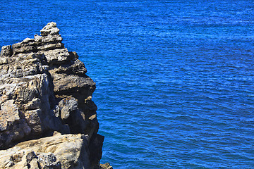 Image showing Rocky Coast Extending into the Sea