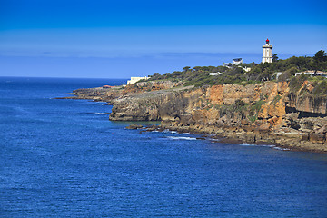 Image showing Rocky Coast Extending into the Sea