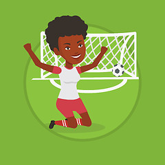 Image showing Soccer player celebrating scoring goal.